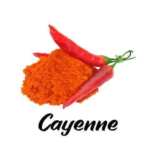 Cayenne pepper powder with red peppers on a white background