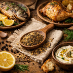 Assorted dishes including fish, chicken, lemon slices, and a wooden spoon with Lemon Pepper Blend on a rustic wooden surface.